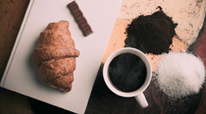 Croissant, coffee, chocolate and sugar