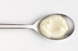 Mayonnaise sauce on a spoon