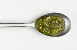 Pesto sauce on a spoon