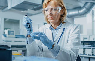 A woman working in a lab.
