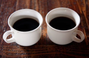 Two cups of black coffee