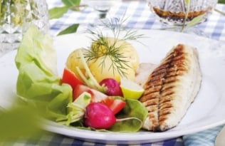 Grilled fish with salad and new potatoes Grilled fish with salad and new potatoes