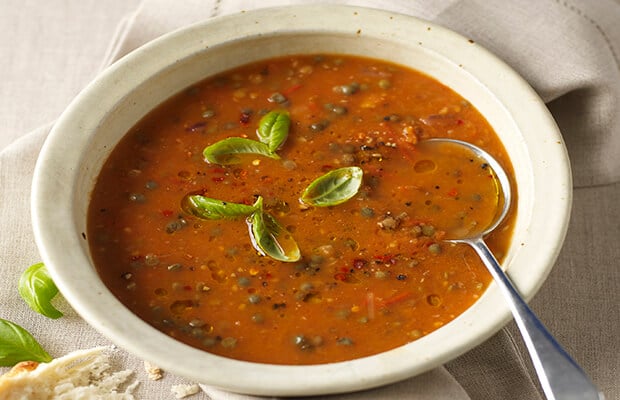 A bowl of tomato and lentil soup