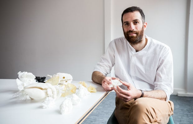 Claudio Capelli, a BHF-funded researcher Claudio Capelli, a BHF-funded researcher, with a collection of 3D printed hearts