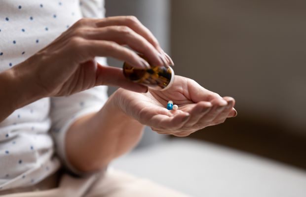 Woman taking medication