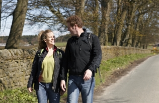 A couple walking in the park 