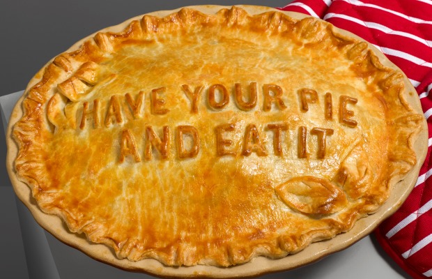 Pastry pie with 'Have your pie and eat it' written on the top.