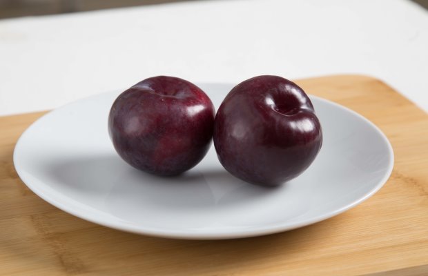 Two whole plums