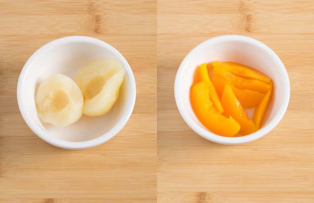 Portions of tinned fruit - pears and peaches