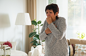 Woman coughing