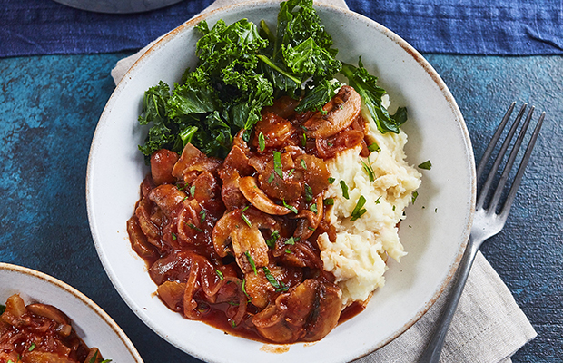 Image of mushroom stew on a blue background