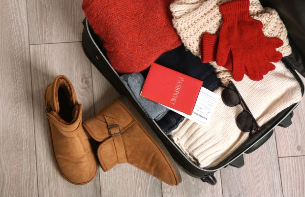 Holidays and travel, suitcase, warm clothes, packing, passport