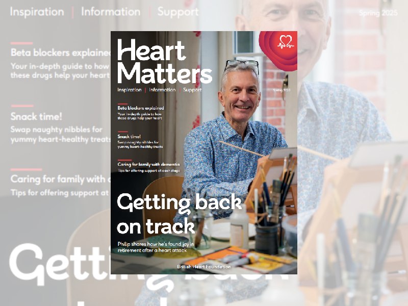 Cover of Heart Matters Spring 2025. Image of man smiling and painting in a blue shirt, with text underneath reading 'Getting back on track'.