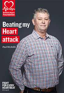 The front cover of the British Heart Foundation's heart attack booklet. It shows a white, middle-aged man standing in front of a plain, grey background, alongside the booklet's title.