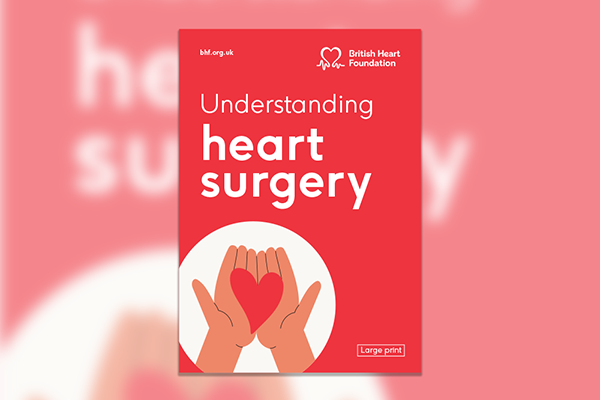 Cover of a booklet in bright red with the title Understanding heart surgery large print. Image of hands holding a heart on the cover.
