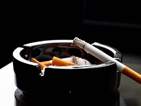 an ashtray filled with used cigarettes