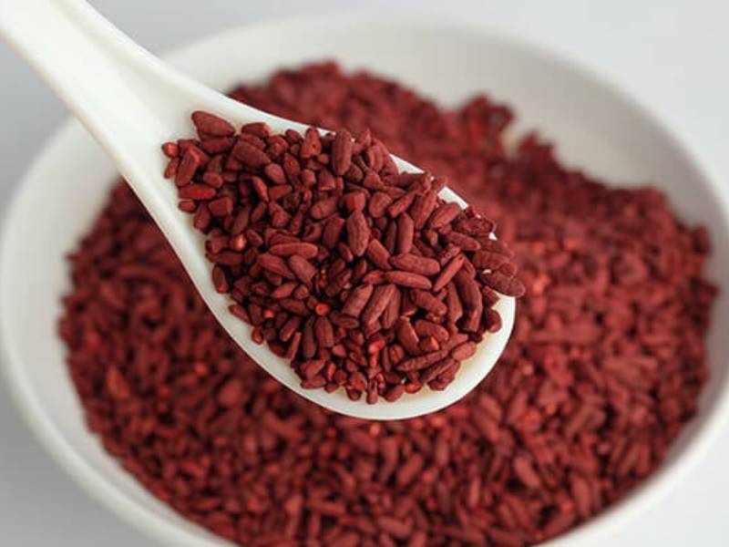 A spoonful of red yeast rice extract.