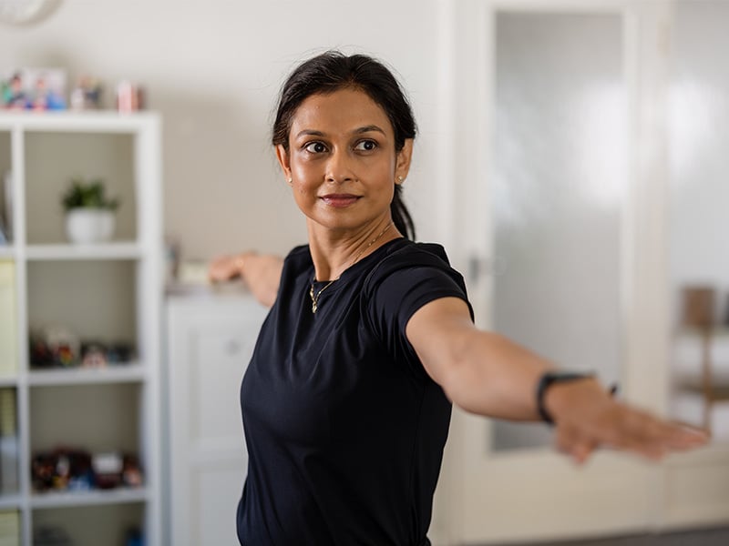 Puloma Kundu practising yoga at home.