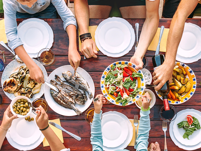 A table with lots of different plates of food