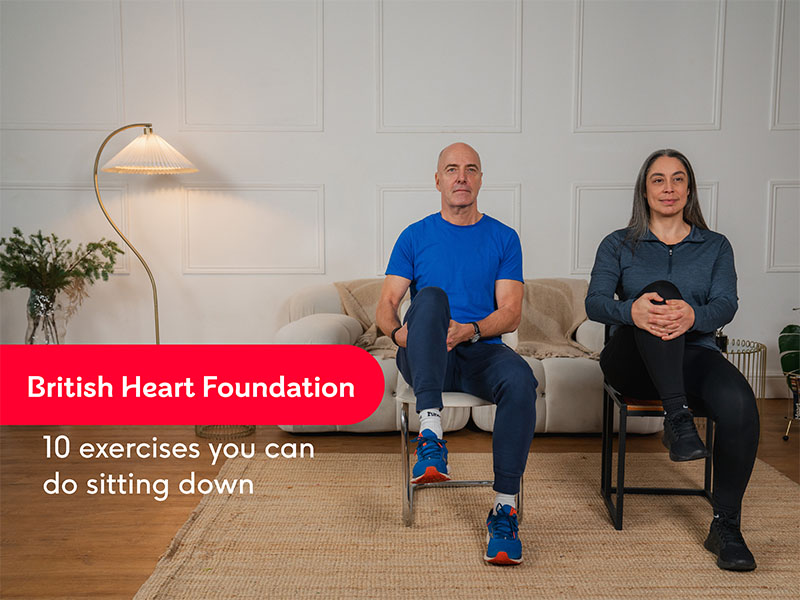 Hara and Robert performing a knee hug with the text "10 exercises you can do sitting down".