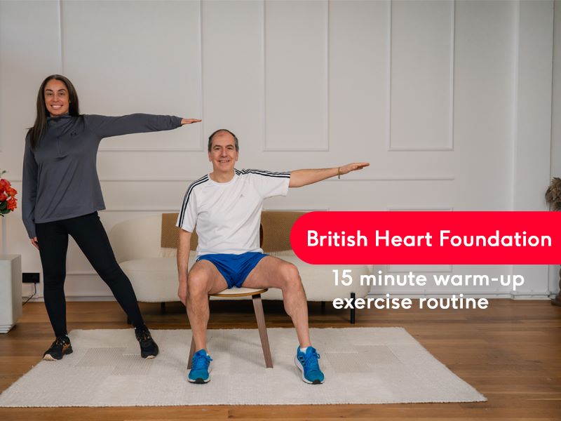 Hara and Stefano warming up with the text '15 minute warm-up exercise routine'