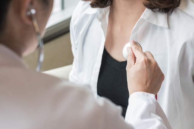 Woman being examined by doctor