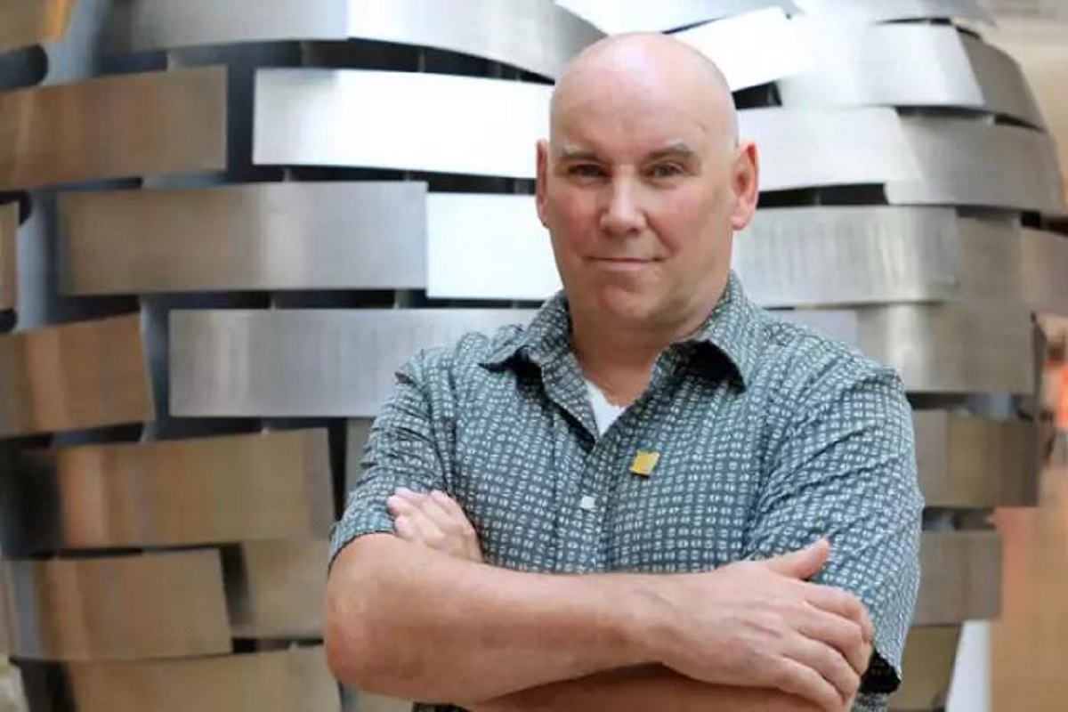 artist Steve Mehdi with the sculpture Heart of Steel