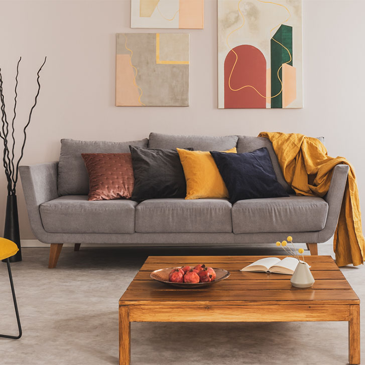 Living room with grey sofa and oak coffee table