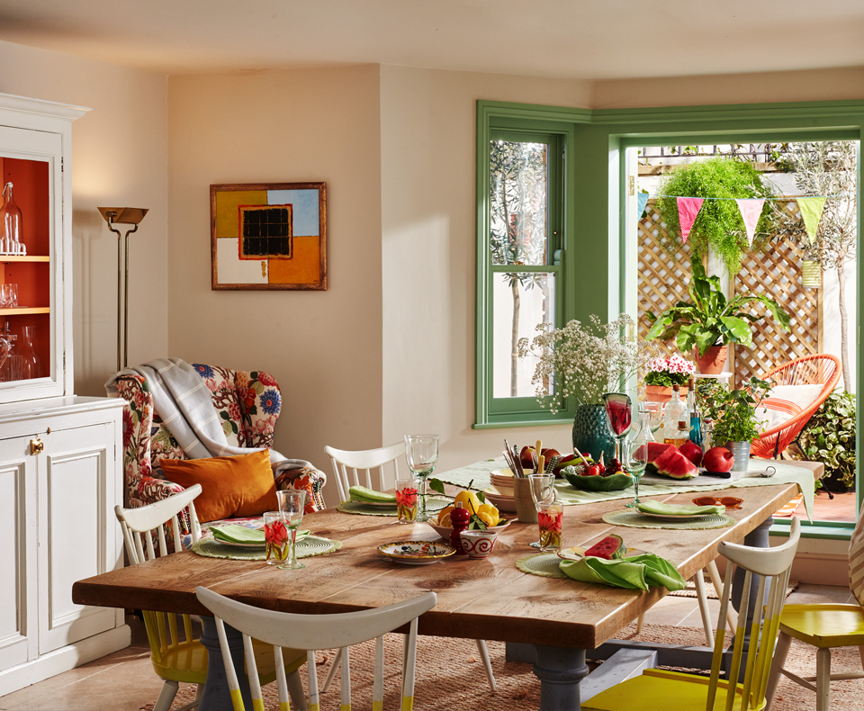 Summery dining room with table and chairs 