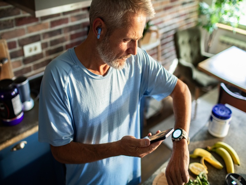 Man checking his watch after exercise