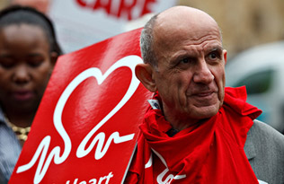A man with a BHF picket board