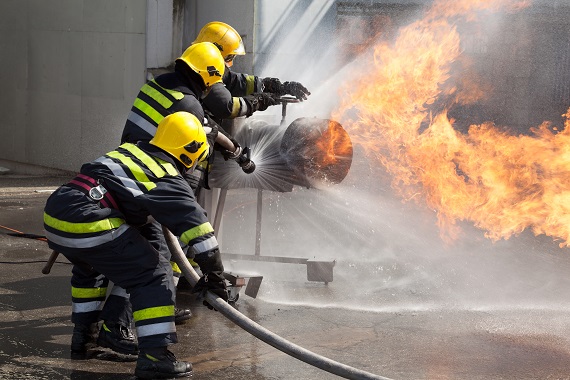 Firefighters putting out a fire