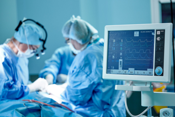 doctors performing surgery