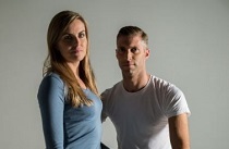 Russell and Rachel standing together