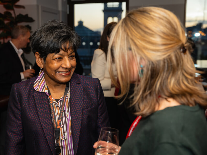 2 women in conversation at Women in Science event