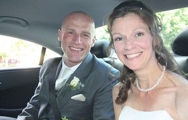 Melanie Mully and her husband Kevin in the car on their wedding day