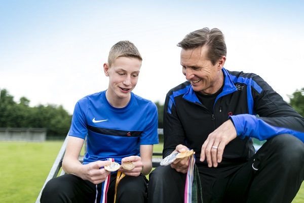Luke Ball and Roger Black compare athletics medals