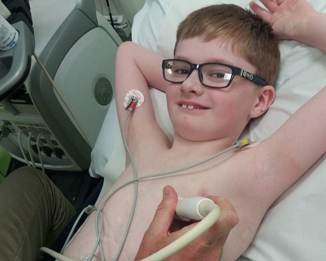 8 year old heart patient Callum has his chest scanned in hospital