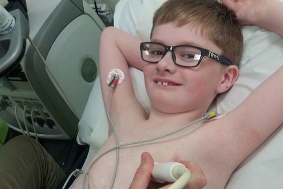 8 year old heart patient Callum Peace has his chest scanned in hospital