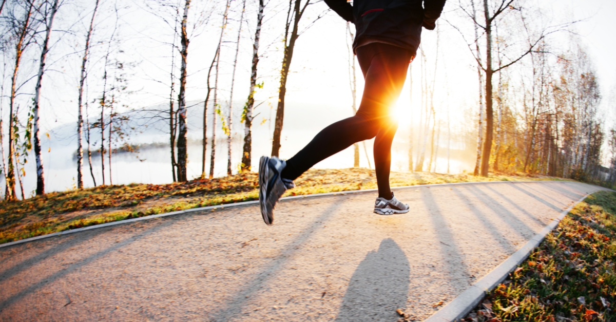 Person running in Autumn sunset