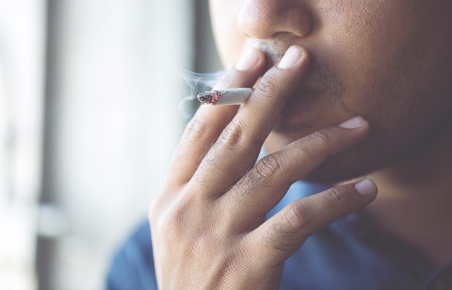 Person smoking a cigarette