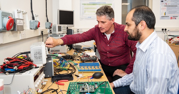 Researchers developing artificial neurons. Photo credit: University of Bath 