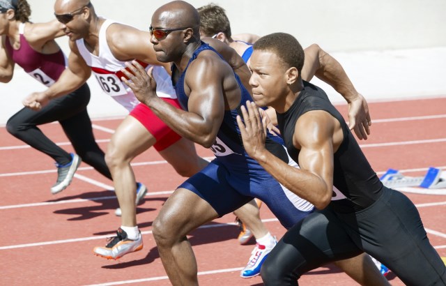 Athletes running on a track