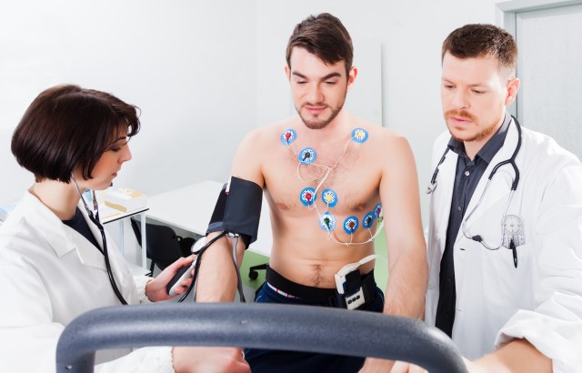 Person being monitored by doctors during an exercise test