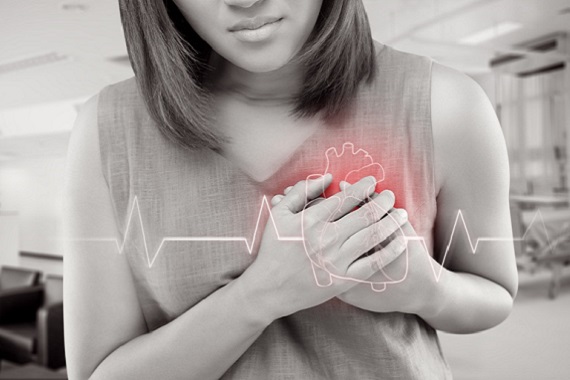 Woman clutching her chest