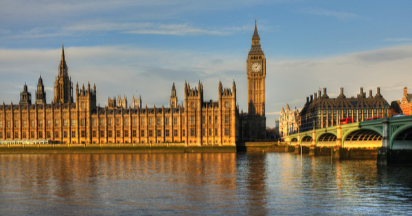 The Houses of Parliament as photographed from the South Bank with the Thames in the foreground