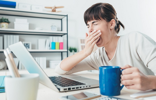 Woman yawning
