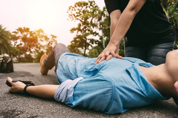 Someone performing CPR