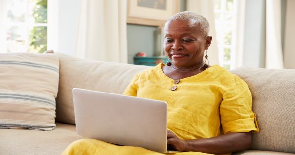 A stock photo of a woman using a laptop