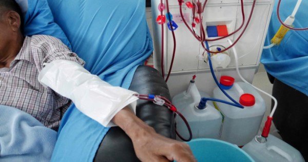 Patient being given dialysis in hospital